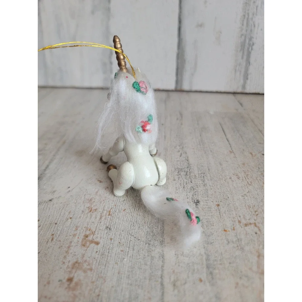 Vintage Kurt Adler unicorn sitting wooden ornament Xmas flower figure